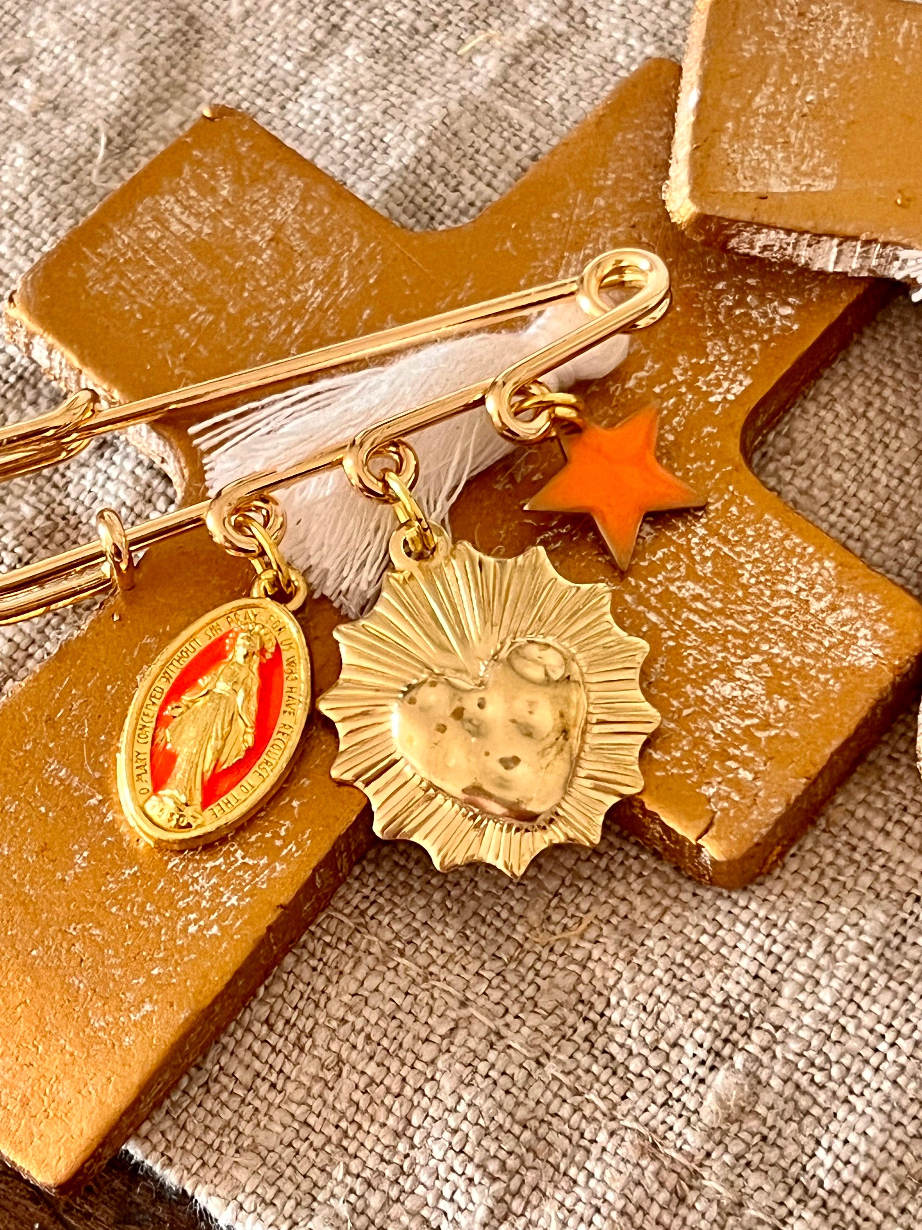 Grigri – Porte-bonheur à médailles Arastuce