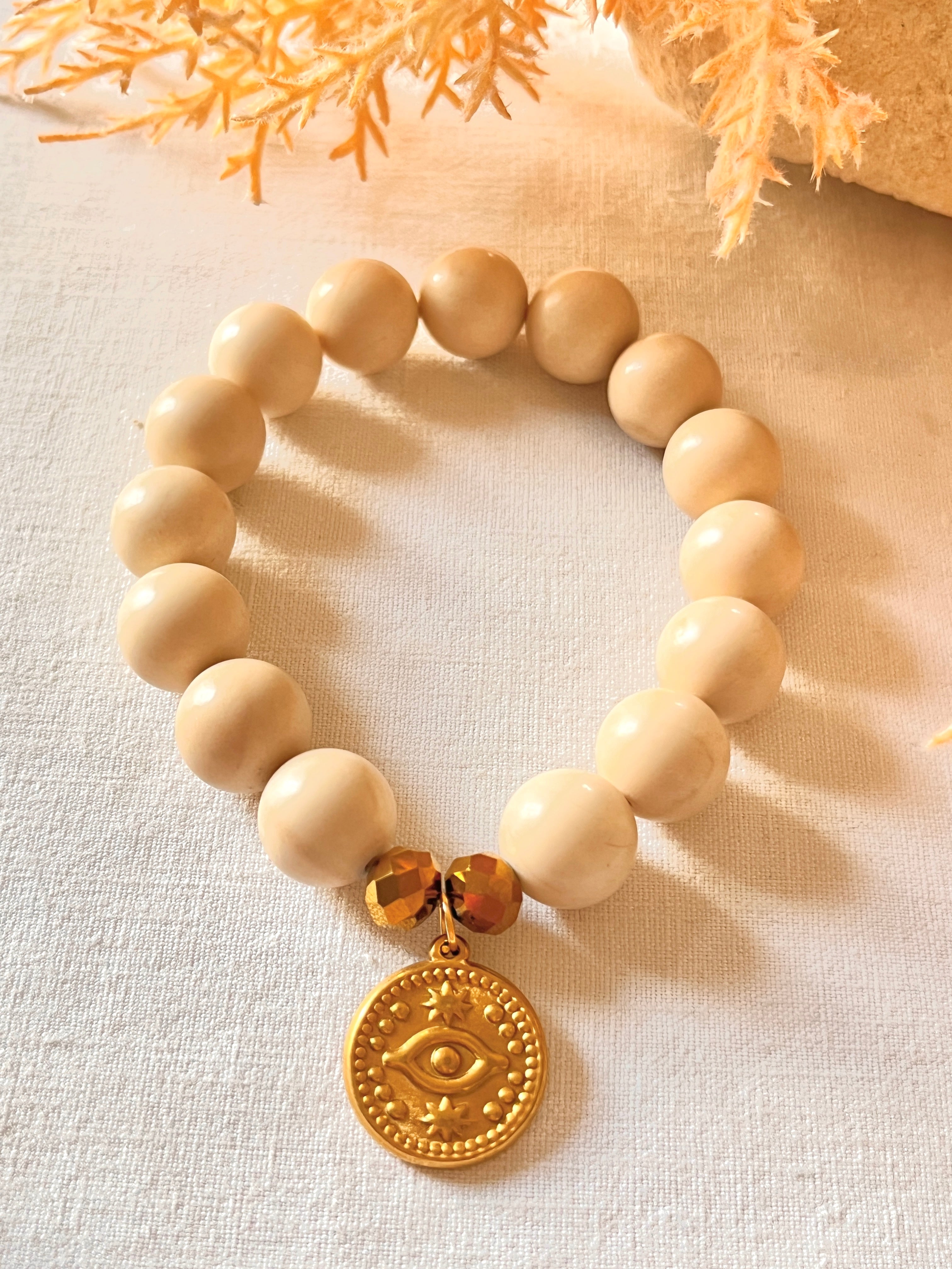 Céleste- Bracelet en pierre naturelle et médaille symbole. Arastuce