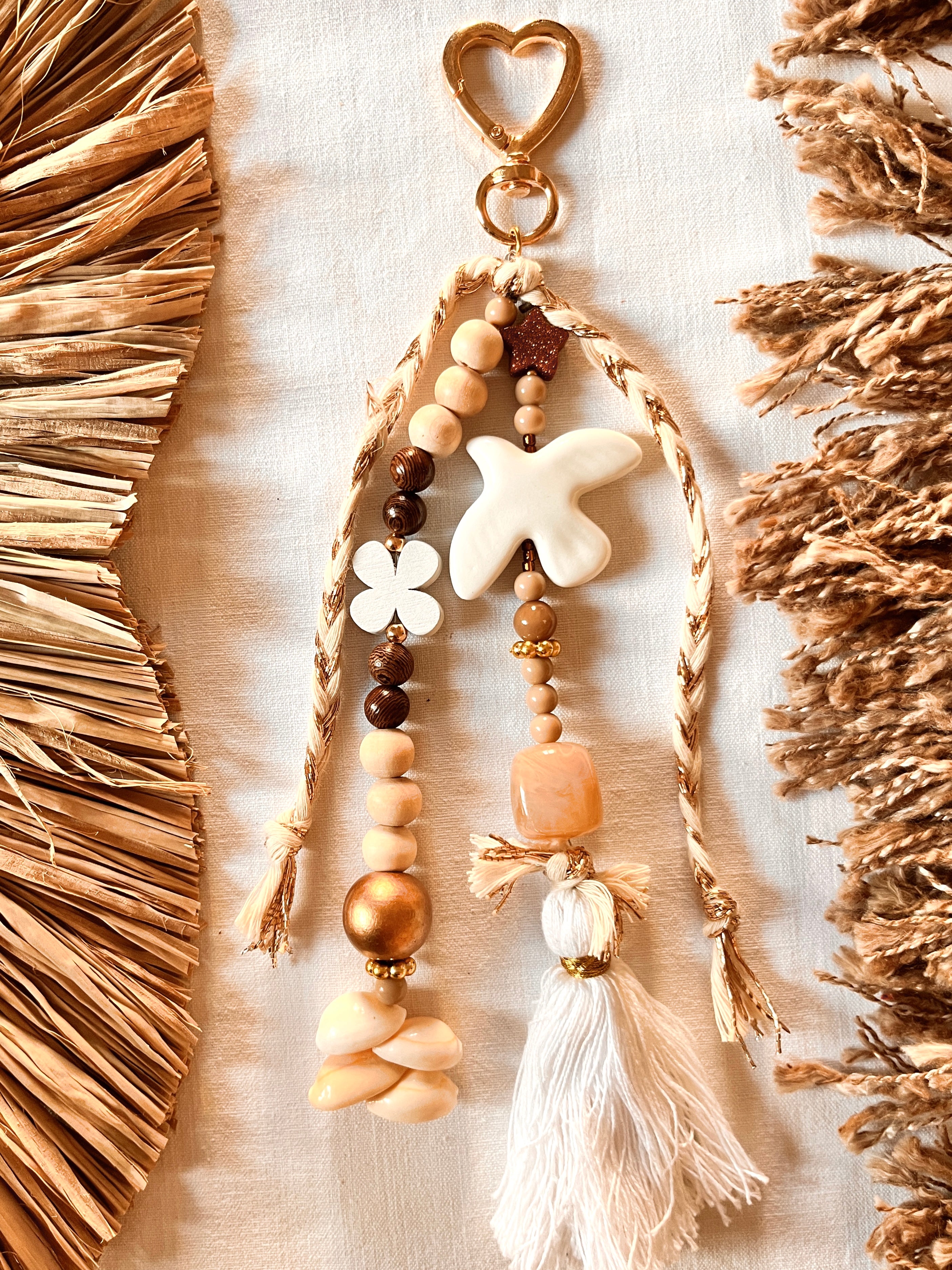 Paloméa– Grigri Colombe et perles coquillage Arastuce