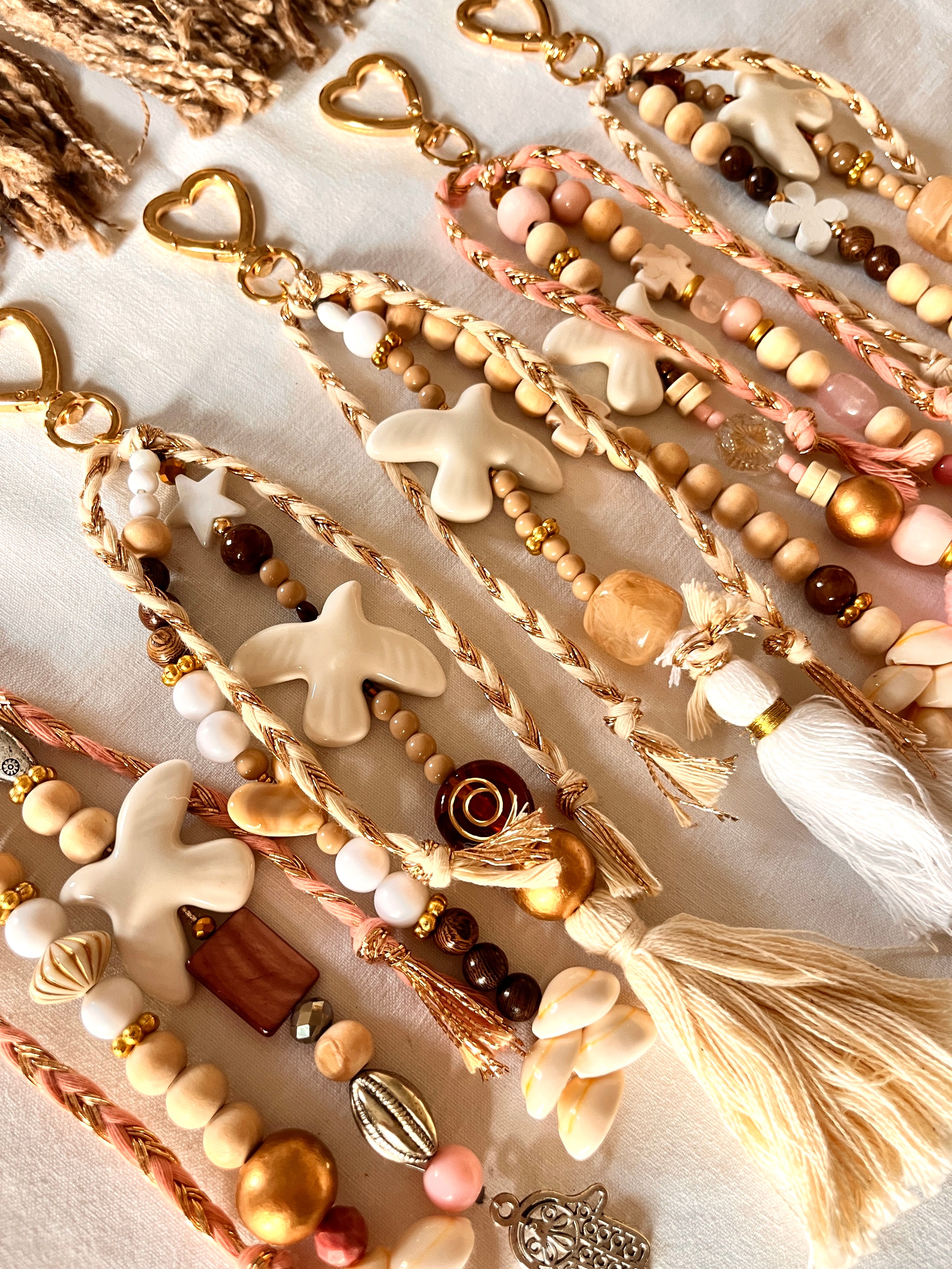 Paloméa– Grigri Colombe et perles coquillage Arastuce