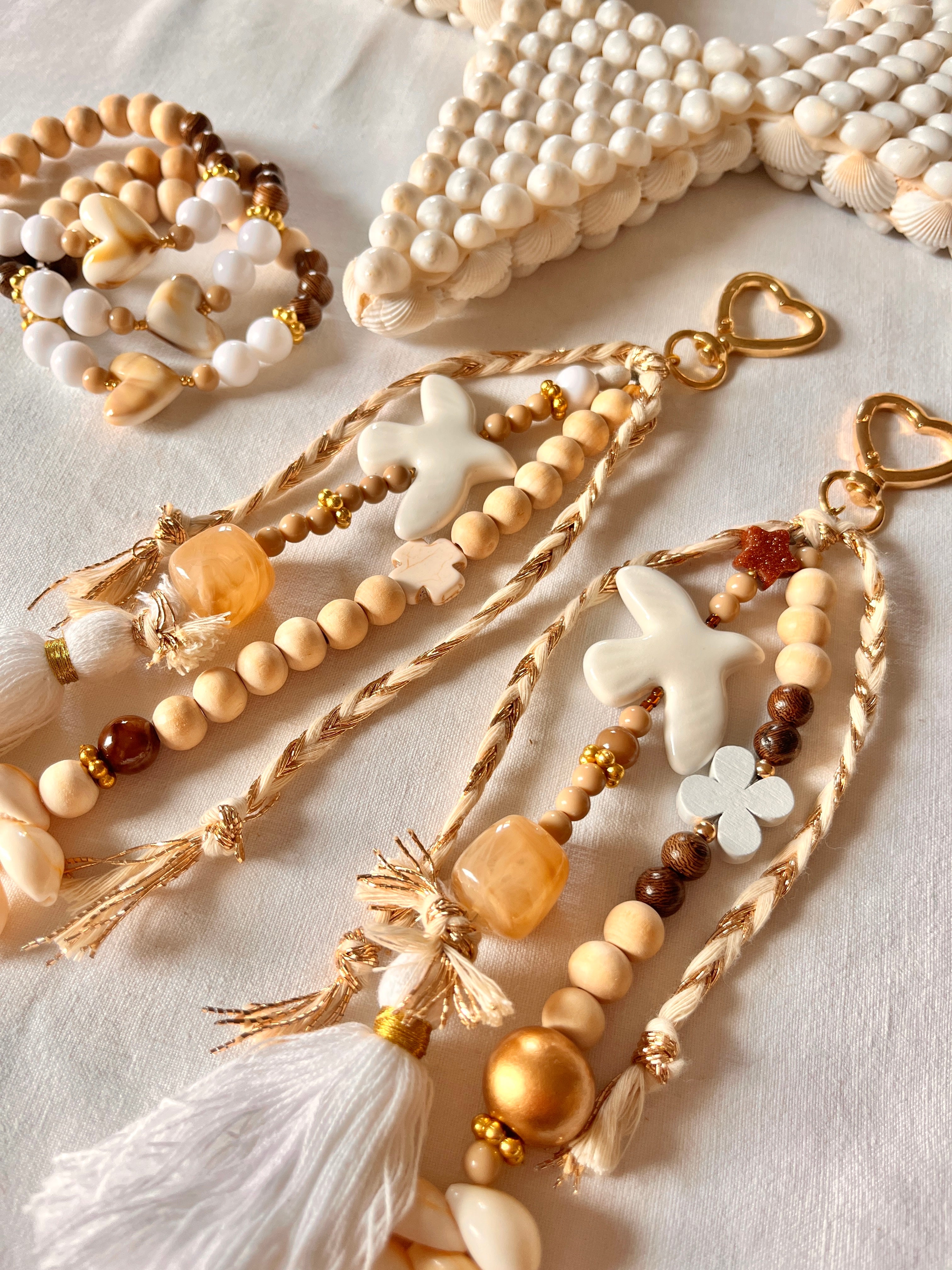 Paloméa– Grigri Colombe et perles coquillage Arastuce